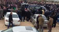 بالصور .. حزن وأسى بتشييع جثماني 'وسام وعمّار' في إربد