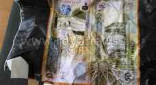 ضبط مشغل تزوير عملة في الكرك .. صور