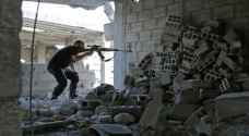 معارك في الغوطة المحاصرة وجثث تحت أنقاض أبنيتها
