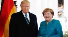 ترمب يشيد بميركل ولن يتراجع عن مواقفه