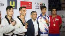 أبو غوش يحصد الميدالية الذهبية بافتتاح بطولة الحسن للتايكواندو