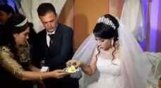 عريس يصفع عروسه خلال حفلة زفافهما - فيديو