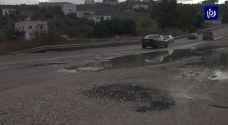 شكاوى من سوء حالة الطريق الرئيسية المؤدية إلى قرية دير السعنة - فيديو