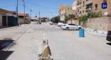 رفع العزل عن بناية وحي في الزرقاء - فيديو