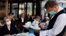 المقاهي تعيد فتح أرصفتها في فرنسا وكورونا يواصل التفشي بأمريكا اللاتينية