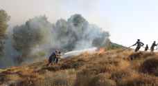 اخماد حريق حسبان والذي امتد لـ 700 دونم