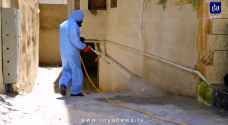 الأمانة تعقم الأماكن التي سجلت فيها إصابات كورونا في عمّان.. فيديو