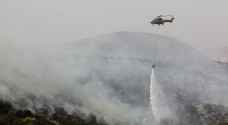 كوادر الدفاع المدني وسلاح الجو الملكي تتعامل مع حريق ضخم في عجلون.. صور
