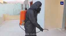 حملة تطهير وتعقيم لعدد من منازل مصابي كورونا في الكرك والأغوار - فيديو
