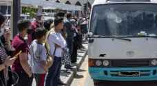 أهالي الزرقاء يشكون "استهتار" أصحاب "الحافلات والسرفيس" بتعليمات كورونا