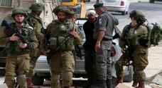 الاحتلال يعتقل ١٤ فلسطينيا من الضفة