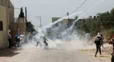 إصابات بالرصاص المعدني وحالات اختناق في مسيرة كفر قدوم بالضفة