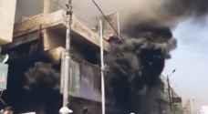 حريق ضخم يلتهم مستودع ألبسة في الرصيفة.. فيديو