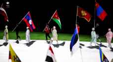 المصاطفة يحمل العلم الأردني في حفل ختام أولمبياد طوكيو
