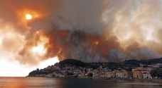 جزيرة إيفيا اليونانية تواصل مكافحة النيران لليوم السابع