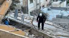 الدفاع المدني لـ "رؤيا": انهيار عمارة اللويبدة تبعه انهيار مبنى آخر