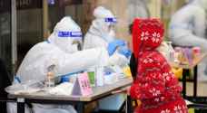الصين تسجل ٢٣ ألف إصابة جديدة بكورونا