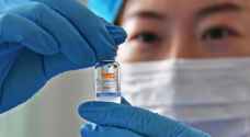 الصين تتعهد بتسريع عمليات تطعيم المسنين ضد كورونا