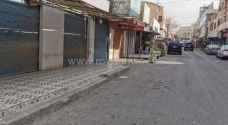 بالصور.. إغلاق محال تجارية في معان والطفيلة على خلفية أزمة النقل