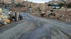 إعادة فتح طريق وادي القمر وشارع الخميرة في الرصيفة