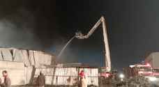 الدفاع المدني يخمد حريقا في ٦ مستودعات قرب السوق المركزي