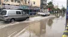 أمطار غزيرة تغمر شوارع معان
