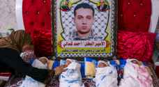 أسير فلسطيني يرزق بـ٤ توائم عن طريق نطف مهربة - صور