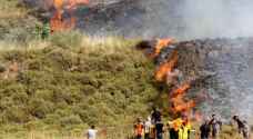 مستوطنون يضرمون النيران بأراضٍ زراعية جنوب نابلس