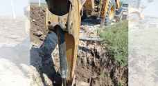 إزالة اعتداءين على أراضي الخزينة ومياه قناة الملك عبد الله بالأغوار الشمالية
