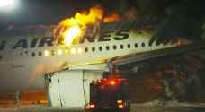 اندلاع النيران في طائرة على مدرج المطار في اليابان